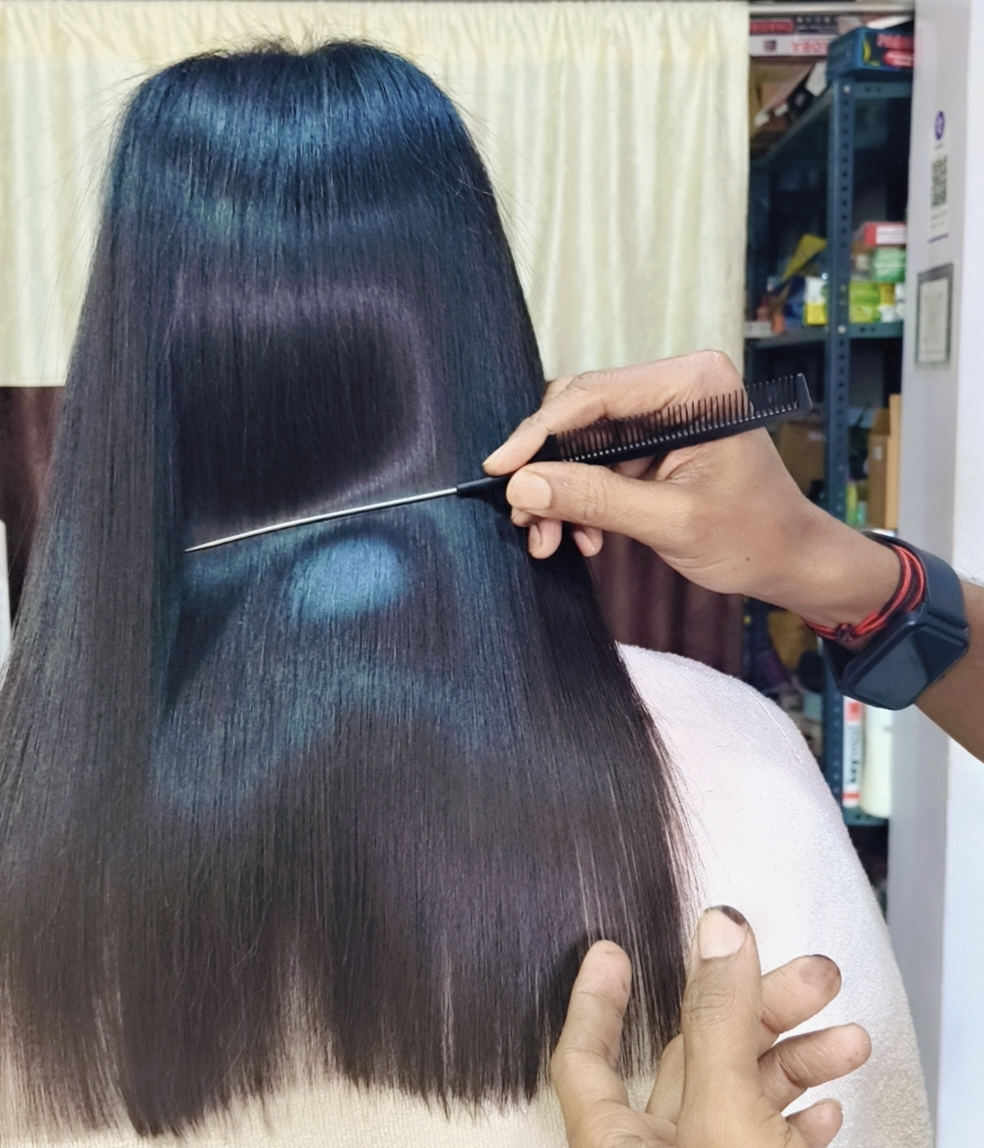 Comb checking a glossy hair treatment result