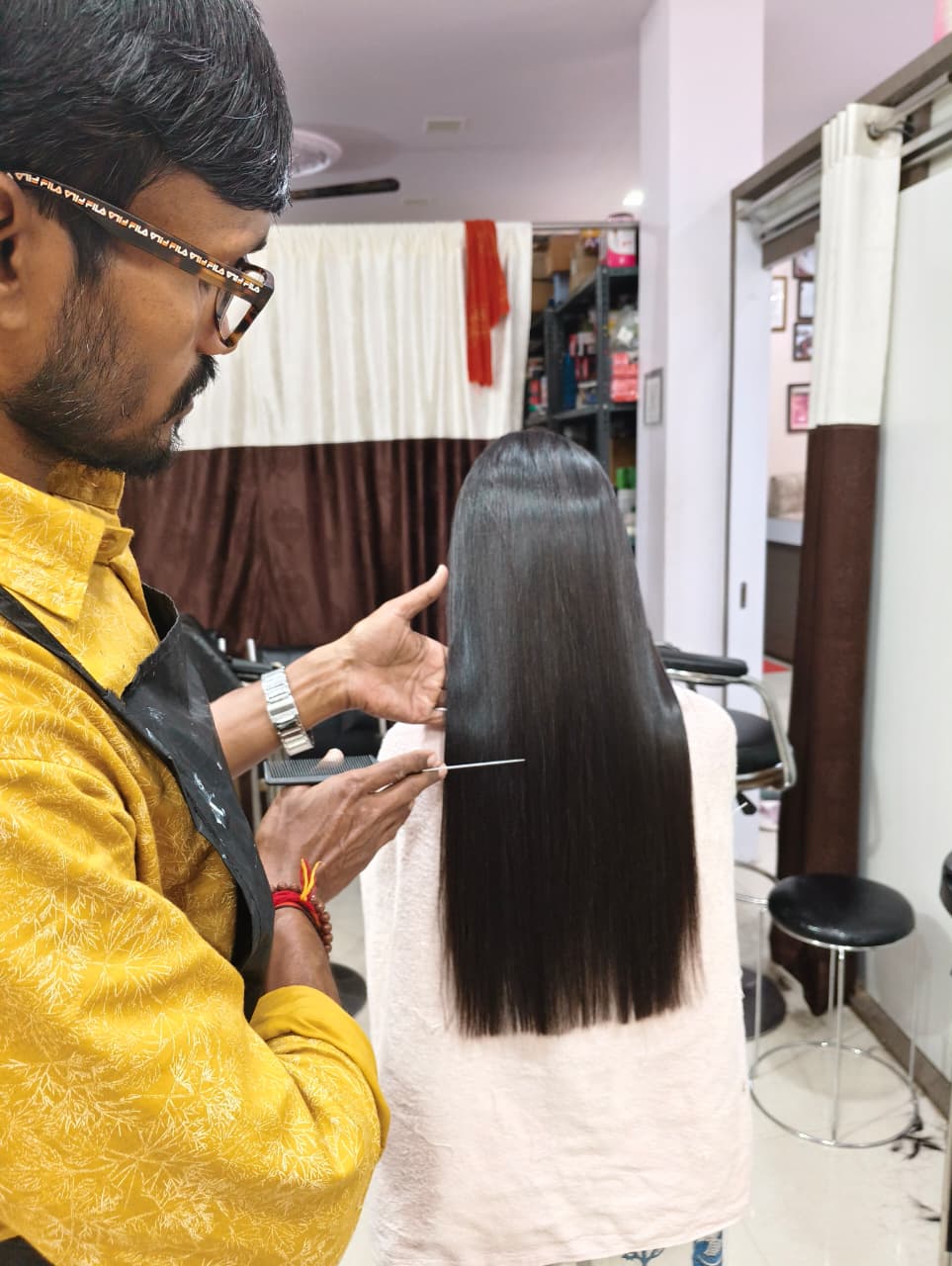 Blow-dry technique being demonstrated to a learner